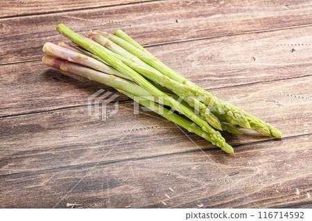 Raw green uncooked asparagus sprout 116714592