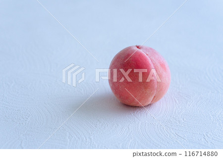 1 peach on a simple white background 1 peach on a simple white background 116714880
