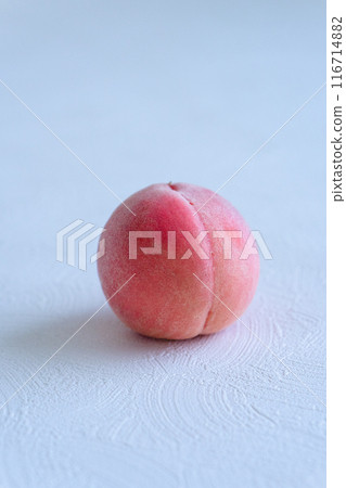 1 peach on a simple white background 1 peach on a simple white background 116714882