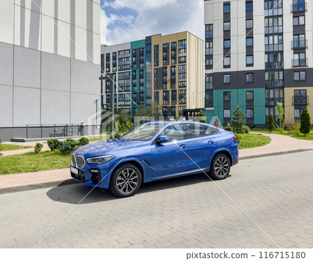 "Modern auto, car parked at contemporary residential buildings "Modern auto, car parked at contemporary residential buildings 116715180