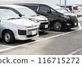 Cars in a parking lot 116715272