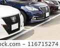 Cars in a parking lot 116715274