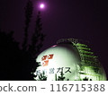 A factory and the moon shining in the dark night 116715388