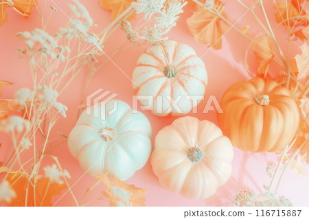 Autumn pumpkins and dried flowers background. Fall ripe harvest vegetables holiday card. Seasonal festive template in pastel colors Autumn pumpkins and dried flowers background. Fall ripe harvest vegetables holiday card. Seasonal festive template in pastel colors 116715887