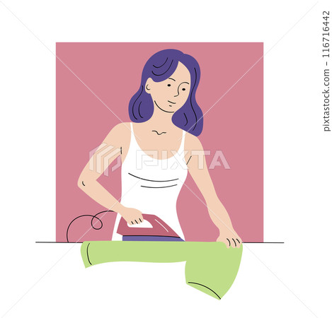 A young woman irons clothes at home 116716442