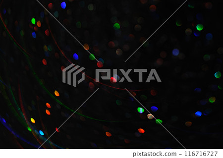 Abstract black background with bokeh of different colors. Abstract black background with bokeh of different colors. 116716727