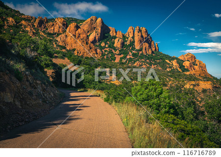 Winding road and red rocks in the Esterel massif, France 116716789