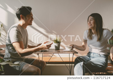 Man and woman have a coffee break time together, happy conversation. Man and woman have a coffee break time together, happy conversation. 116717124