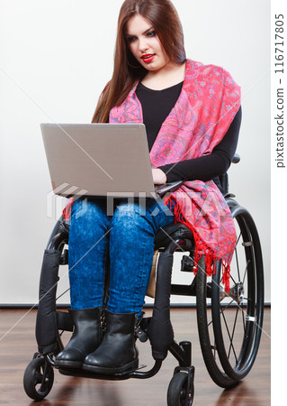 Disabled woman with laptop 116717805
