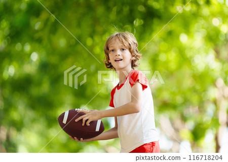 Family playing American football. Kids play rugby 116718204