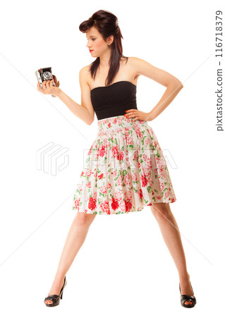 Teen girl with old camera 116718379