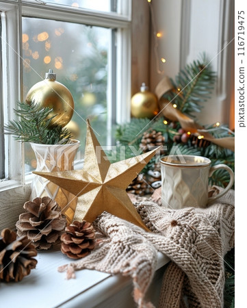 Gold Star and Pine Cones on Window Sill 116719475