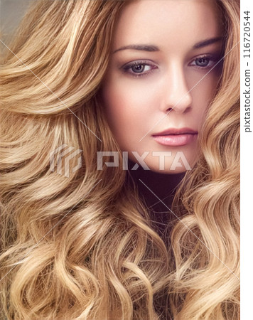 Beautiful modern blonde woman with volume hairstyle, long luxurious hair and beauty makeup, glamorous look face portrait for luxury fashion and natural cosmetics idea 116720544