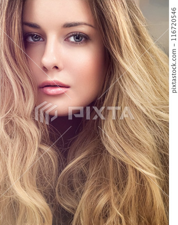 Beautiful modern blonde woman with volume hairstyle, long luxurious hair and beauty makeup, glamorous look face portrait for luxury fashion and natural cosmetics idea 116720546
