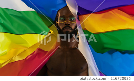 African American gay man with bright makeup and 116720925