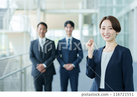 Business woman doing a fist pump 116721551