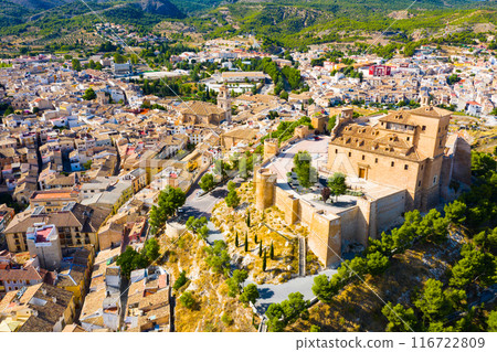 View from drone of of Caravaca de la Cruz overlooking Castle and Basilica, Spain 116722809