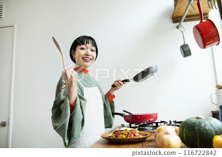 Young woman making gapao rice Young woman making gapao rice 116722842