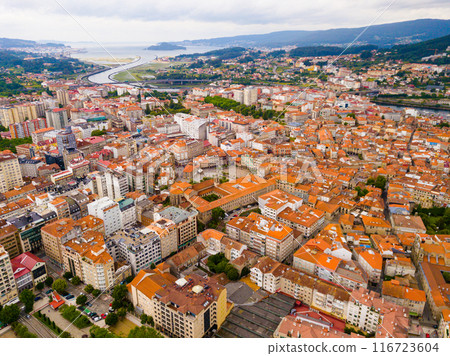 Aerial view of Pontevedra with view of buildings and sea bay,  116723604