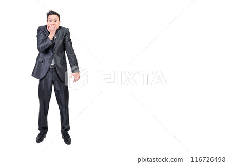 Nervous businessman biting nails in studio. White background. Nervous businessman biting nails in studio. White background. 116726498