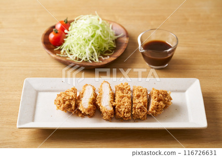 Pork cutlet served on a plate 116726631