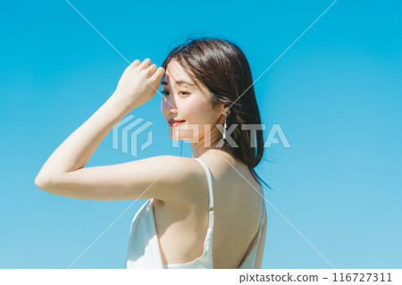 Image of young woman's UV care 116727311