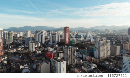 Aerial view of the silhouette of skyscrapers and the city center of Kuala Lumpur. Aerial view of the silhouette of skyscrapers and the city center of Kuala Lumpur. 116727811