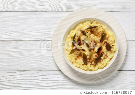 Brown Butter Potato Mash with fried sage leaves Brown Butter Potato Mash with fried sage leaves 116728057
