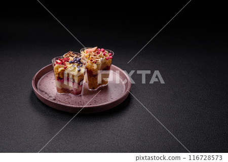 Delicious nutritious vegan dessert trifle with berries, cheese cream Delicious nutritious vegan dessert trifle with berries, cheese cream 116728573