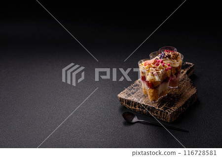 Delicious nutritious vegan dessert trifle with berries, cheese cream 116728581