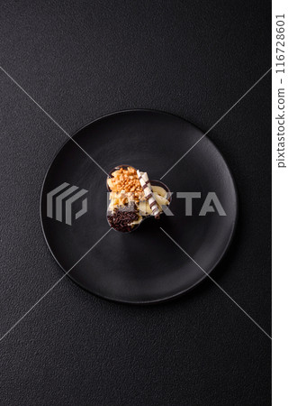 Delicious nutritious vegan dessert trifle with berries, cheese cream 116728601