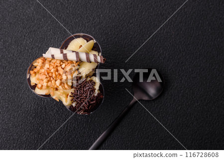 Delicious nutritious vegan dessert trifle with berries, cheese cream 116728608