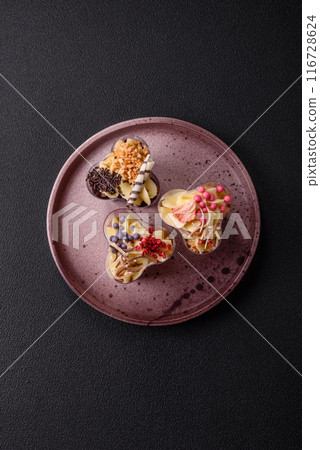 Delicious nutritious vegan dessert trifle with berries, cheese cream Delicious nutritious vegan dessert trifle with berries, cheese cream 116728624