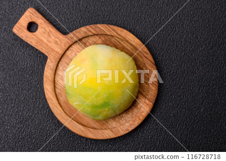 Delicious sweet chilled mochi desserts with fruit filling 116728718