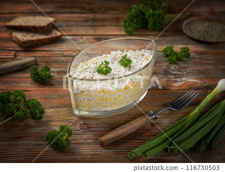Grated eggs and cheese layered with polenta Grated eggs and cheese layered with polenta 116730503