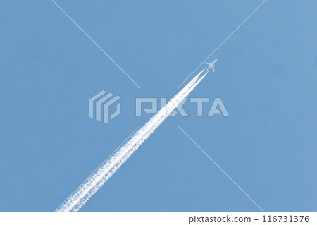 Airplane flying high (planet trail) 116731376