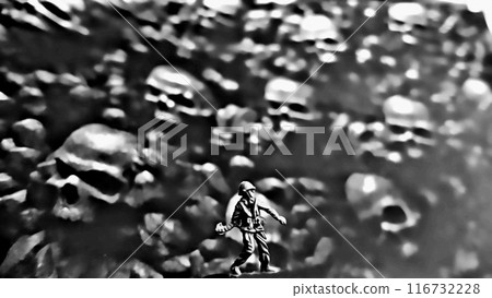 A soldier throwing a grenade into the immense sea of death he himself caused. Black and white. 116732228