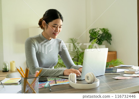 Young female architect envisions project with technology. Young female architect envisions project with technology. 116732446