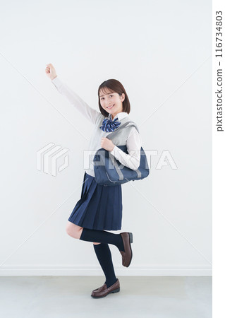 Full body of a high school girl posing in a fist 116734803