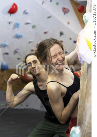 girl climbing up the wall 116735379