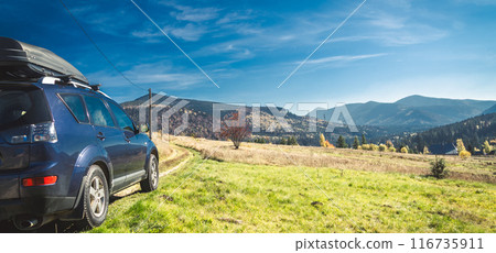 car for traveling with a mountain road 116735911