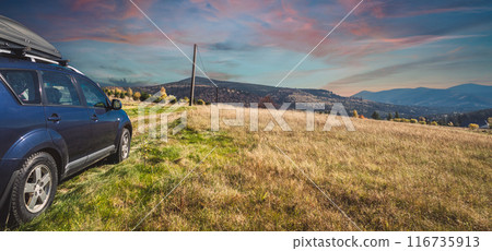 car for traveling with a mountain road 116735913
