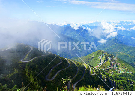 Old Silk Route Zig Zag Road with Zuluk Village in Background 116736416