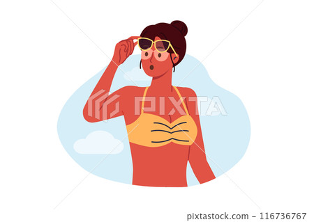Woman sunbathing received sunburn on body and uneven tan due to sunglasses on eyes 116736767