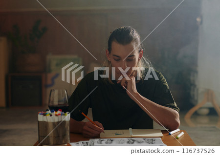 Designer Working At His Worklace Designer Working At His Worklace 116737526