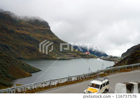 Lake named Tsomgo or Changu in Between Mountain range at East Sikkim 116737576