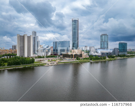 Yekaterinburg city with Buildings of Regional Government and Parliament, Dramatic Theatre, Iset Tower, Yeltsin Center, panoramic view at summer sunset. 116737968
