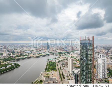 Yekaterinburg city with Buildings of Regional Government and Parliament, Dramatic Theatre, Iset Tower, Yeltsin Center, panoramic view at summer sunset. 116737971