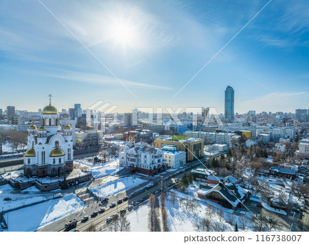 Winter Yekaterinburg and Temple on Blood in beautiful cloudy sunset. Aerial view of Yekaterinburg, Russia. Translation of the text on the temple Winter Yekaterinburg and Temple on Blood in beautiful cloudy sunset. Aerial view of Yekaterinburg, Russia. Translation of the text on the temple 116738007