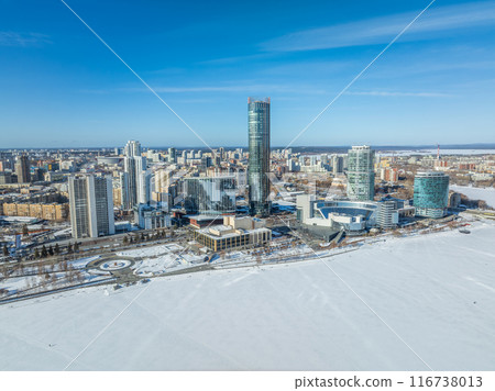 Yekaterinburg city with Buildings of Regional Government and Parliament, Dramatic Theatre, Iset Tower, Yeltsin Center, panoramic view at winter sunset. Yekaterinburg city with Buildings of Regional Government and Parliament, Dramatic Theatre, Iset Tower, Yeltsin Center, panoramic view at winter sunset. 116738013